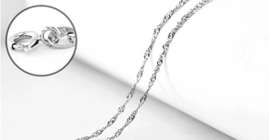 Close-up of S925 sterling silver water wave chain with spring clasp detail and stamp