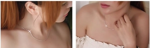Detailed view of elegant s925 sterling silver water wave chain necklace on model