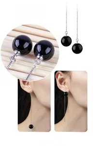 Detail of adjustable 925 silver threader earrings with glossy black onyx beads