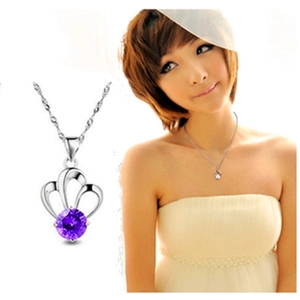 925 sterling silver crown necklace featuring a large round purple cubic zirconia pendant