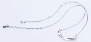 Detail of S925 sterling silver deer antler pendant necklace with lobster clasp closure