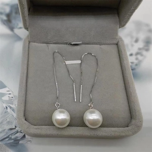 Elegant S925 sterling silver drop earrings with large white pearls and long tassel chains