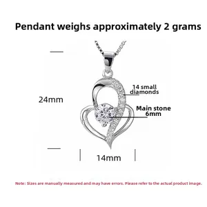 Detail view showing a 925 sterling silver heart pendant with 24mm height and 14mm width