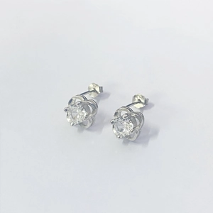 S925 sterling silver clover stud earrings with hollow petal design and clear zircons