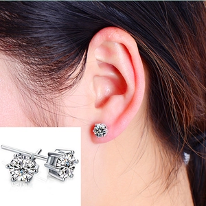 Classic S925 sterling silver six-prong cubic zirconia stud earrings shown on model