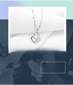 Macro shot of 925 sterling silver heart necklace with a large round cubic zirconia stone