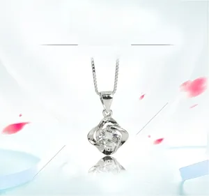 Detail of S925 sterling silver necklace with geometric pendant and sparkling zircon