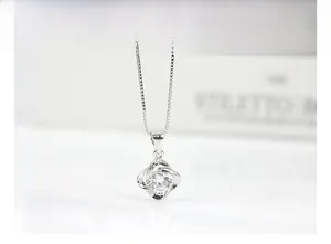 Detail showing the intricate micro-pave cubic zirconia setting on S925 silver necklace