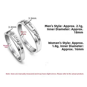 Detailed view of S925 sterling silver couple rings with engraved I love you and 1314