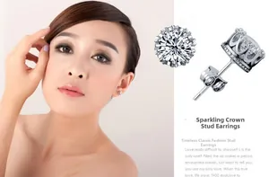 Dettaglio di orecchini a corona in argento sterling 925 con zirconi su una modella