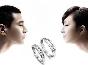 Detail of S925 sterling silver couple rings with 1314 engraving and zircon stone inlay