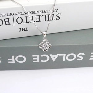 Minimalist S925 sterling silver necklace featuring a floral geometric micro-set pendant