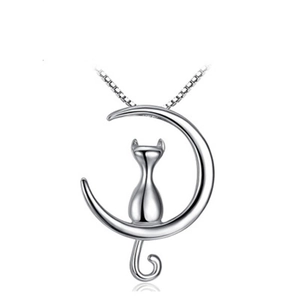Detailed view of S925 sterling silver crescent moon and cat pendant on a fine chain necklace