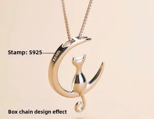 Detailed macro shot of S925 sterling silver moon cat pendant with polished box chain