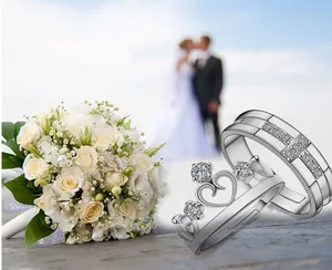 Detail of silver crown ring and band with cubic zirconia in a wedding setting