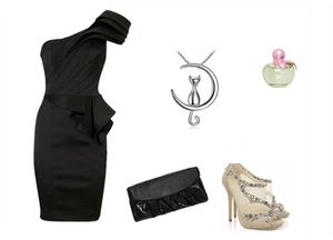 Detail of silver cat and moon pendant necklace styled with elegant black party dress