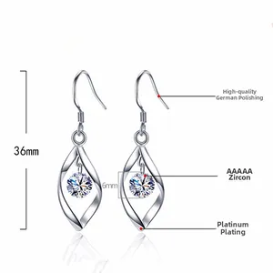 Detail view of twisted silver earrings with 6mm AAA zircon stones, 36mm height