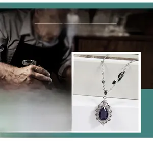 Macro shot of S925 silver necklace with teardrop purple amethyst and diamond halo