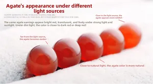 Detailed view of natural red agate beads showing color shifts under different lighting
