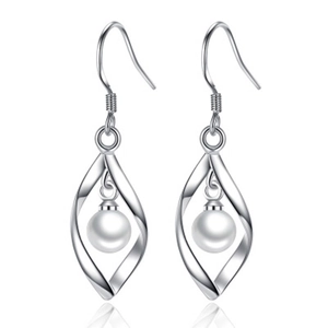 Detail of silver twist flame earrings with white pearl drop and curved ear hook