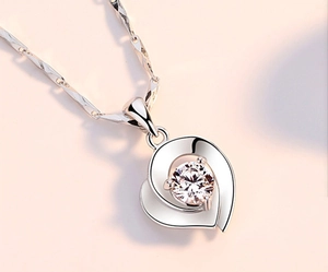 Macro shot of S925 sterling silver double heart necklace with a sparkling cubic zirconia