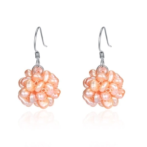 Macro shot of S925 sterling silver hook earrings with cluster of pink baroque pearls