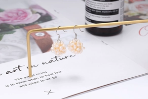 Elegant s925 silver hook earrings with cluster of natural creamy white freshwater pearls