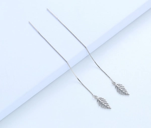 Detailed view of silver S925 long leaf tassel earrings with sleek box chain design