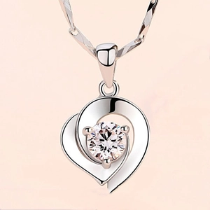 Elegant S925 sterling silver necklace featuring a double heart pendant with sparkling zircon