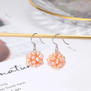 Elegant s925 silver drop earrings with spherical pink-orange freshwater pearls