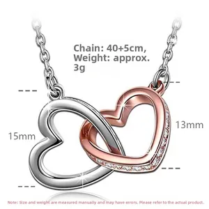 Detail of interlocking S925 silver and rose gold heart necklace with size dimensions