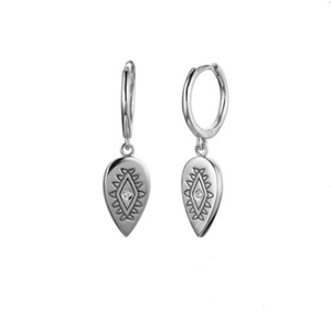 Macro detail of S925 sterling silver teardrop earrings with engraved geometric patterns
