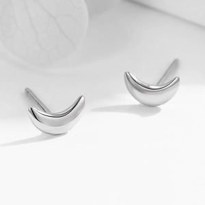 Polished S925 sterling silver moon stud earrings with a minimalist crescent design