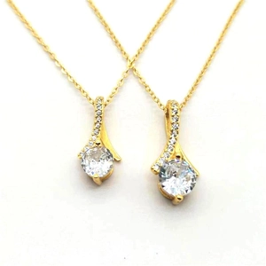 Elegant S925 sterling silver necklace featuring a round zircon pendant in gold finish