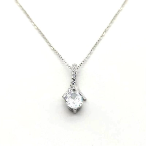 Detail of s925 sterling silver necklace with pavé zircon pendant and round main stone
