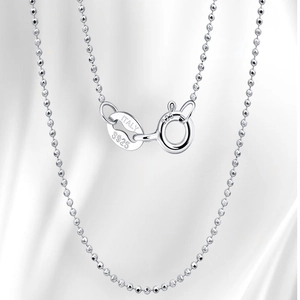 Macro shot of S925 sterling silver ball chain featuring Italian hallmark and spring ring clasp