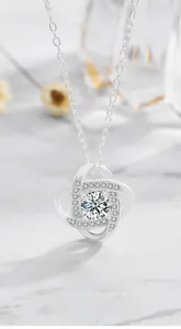 Detailed view of 925 silver necklace featuring a sparkling diamond interlaced knot pendant