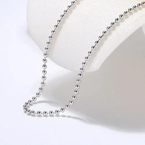 Detailed view of polished S925 sterling silver bead chain with smooth spherical links