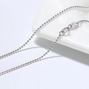 Close-up of S925 sterling silver bead chain showing the spring clasp and Italy stamp