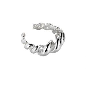 Macro view of sterling silver ear cuff featuring a classic twisted rope texture design