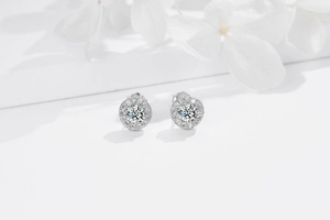 Macro detail of S925 sterling silver halo stud earring with sparkling cubic zirconia stones