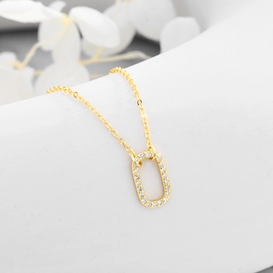 Minimalist 925 silver egg-shaped necklace with paved zircons and gold plating finish