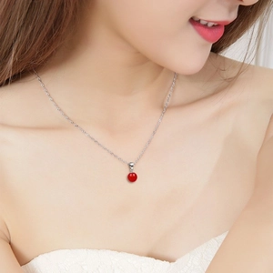 S925 sterling silver necklace featuring a red agate pendant on a dainty cable chain