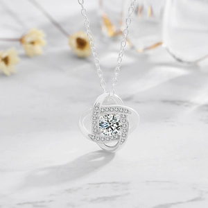 Elegant 925 sterling silver Mobius loop necklace with sparkling heart-shaped diamond pendant