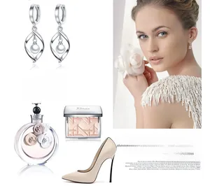 Detail of S925 silver twist drop earrings with white pearl and elegant metal frame