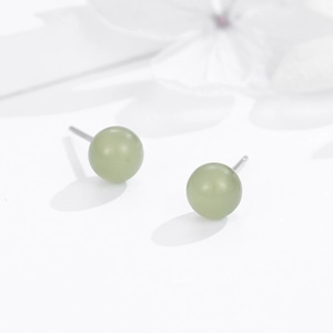 Minimalist 925 sterling silver stud earrings with polished green sphere stones