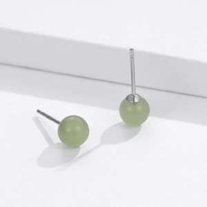 Minimalist 925 sterling silver stud earrings with polished green agate stone spheres