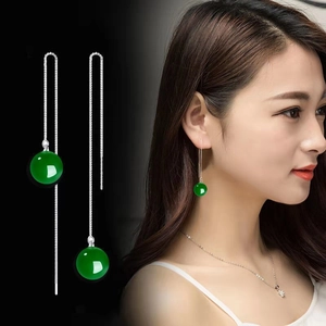 Detail of S925 silver tassel earrings featuring green agate beads and long drop chain