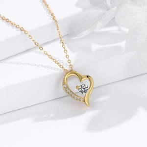 Gold S925 sterling silver heart pendant necklace with a brilliant round center stone