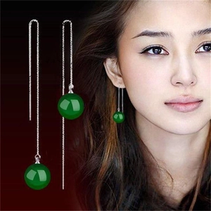 Detailed view of S925 sterling silver long tassel earrings with green agate beads